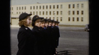 1947: group of proud women soldier, giving guard of honour in front of building