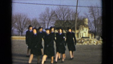 1947: ladies in uniform marching in single file line NEW YORK