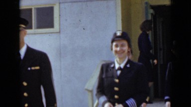 1947: high ranking men and women in dark military uniforms exit building