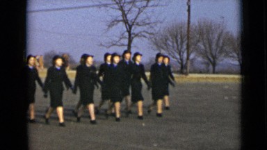 1947: uniform girls walk NEW YORK
