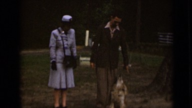 1947: people commanding their dog NEW YORK