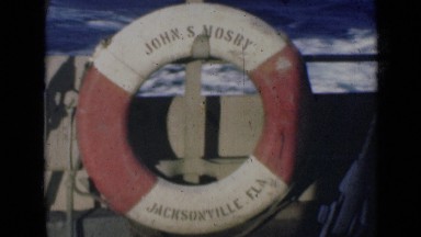 1947: life preserver on side of boat with words john s. mosby, jacksonville
