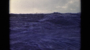 1947: large rolling blue waves, cloudy gray sky PERSIAN GULF
