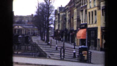 1946: Street Scene with Historic Buildings, Steeples, and Towers in the Netherlands