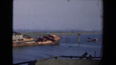 1946: medium sized ship remaining drowned in water near to shore NETHERLANDS