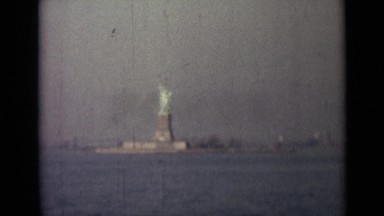 1946: Statue of Liberty in Deep Blue Ocean with Heavy Waves