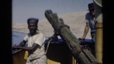 1946: lady is getting up and down on boat through rope SUEZ CANAL EGYPT