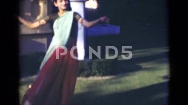 1947: Women in Traditional Indian Attire Perform Graceful Dance