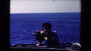 1946: man taking photography about beautiful ocean NETHERLANDS