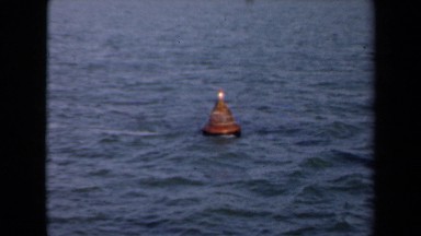 1946: red conical buoy floating at sea anchored on seabed NETHERLANDS