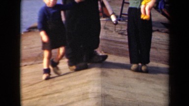 1946: family with children standing in shore near ship NETHERLANDS