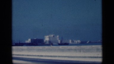 1946: buildings and road alongside side buildings and traffic is moving EGYPT