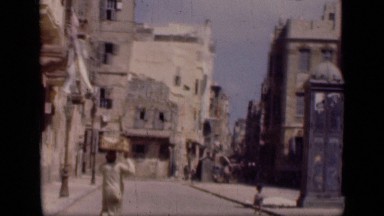 1946: the person walking on road and baby was playing EGYPT