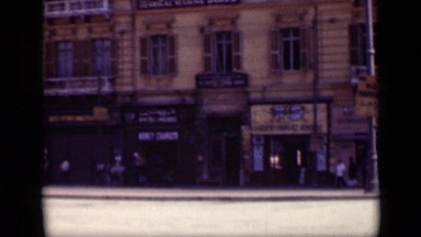 1946: man walking along road across buildings EGYPT