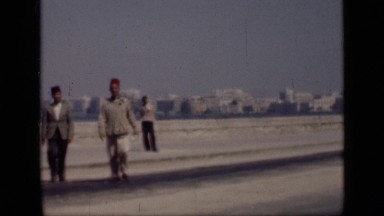 1946: friends crossing road EGYPT