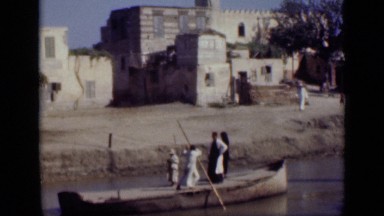 1946: people in foreign country traveling by boat. EGYPT