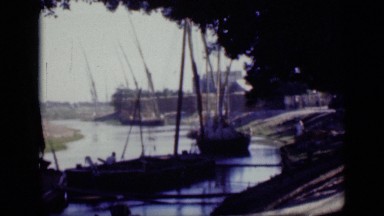 1946: country boats with passengers waiting in small river near to shore EGYPT