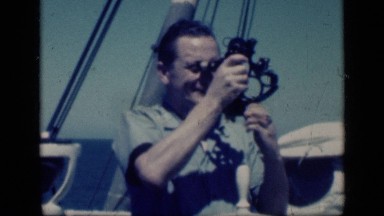 1946: man on boat watching through instrument. EGYPT