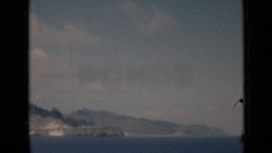 1946: View of Large Body of Water with Landmass in Aden Yemen