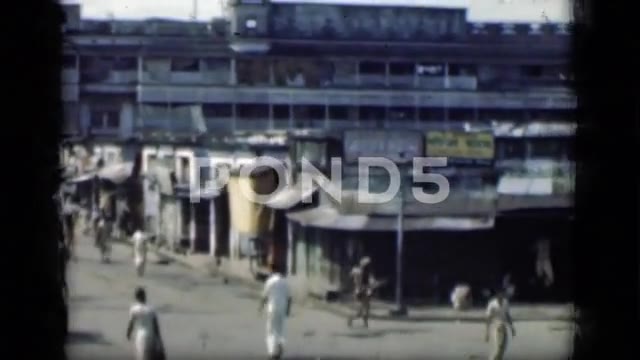 1946: Group of Indian People Walking Together in Street, Bombay India
