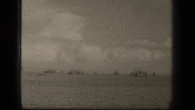 1944: beachhead, leyte, ships on water in distance and at horizon LEYTE GULF