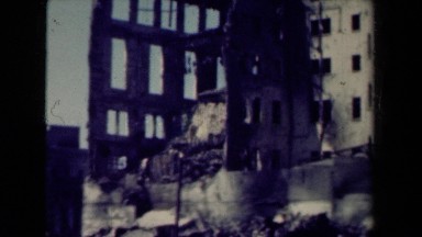 1944: partially destructed buildings with remnants scattered around MANILLA