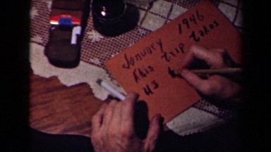 1945: man writing something for someone who made his love. FRANCE