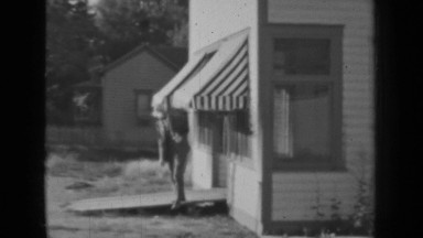 1937: man come from shop BEND OREGON
