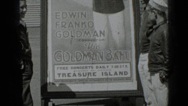 1937: group of young people looking at concert advertisement on street side