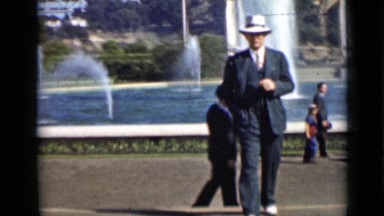 1937: middle age men walking in front of beautiful waterfalls SAN FRANCISCO