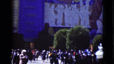 1937: the peoples are walking around nice statues place SAN FRANCISCO