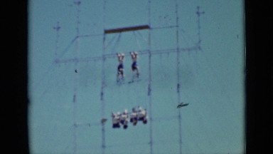 1937: two men and four women performing on trapeze SAN FRANCISCO