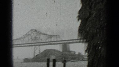 1937: bridge is located on river and human beings watching place. SAN FRANCISCO