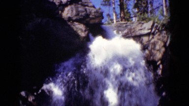 1938: the water is falling down from top of rock COLORADO