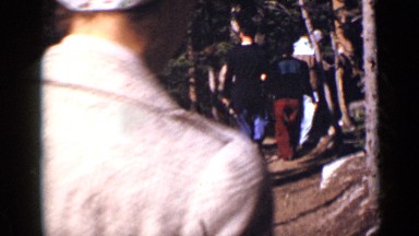 1938: group of people walking down trail COLORADO