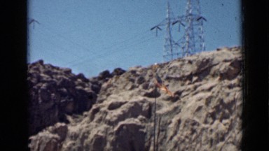 1939: flag waving near top of hill in remote rural area on clear day. ARIZONA