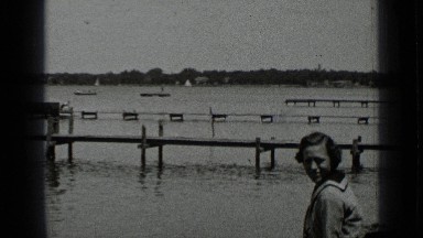 1939: women and men having fun at lake and taking sun bath CLEAR LAKE CALIFORNIA