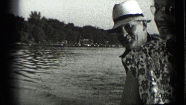 1939: couple are riding in boat for enjoying their life CLEAR LAKE CALIFORNIA