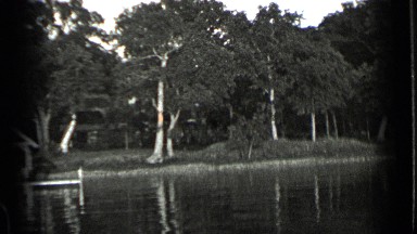 1939: boat with camera at end shooting nice scenery CLEAR LAKE CALIFORNIA