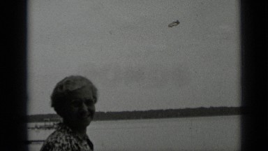 1939: women smiling to camera next to lake. CLEAR LAKE CALIFORNIA