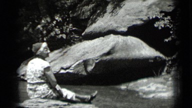 1939: two ladies enjoying beauty of river flowing amid rocks CLEAR LAKE