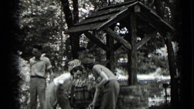1939: group of people standing at well. CLEAR LAKE CALIFORNIA