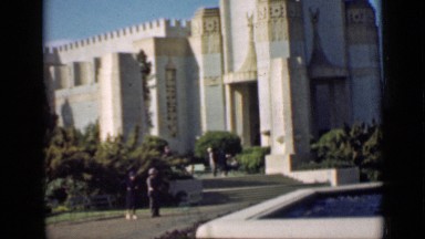 1939: video pans as it shows off large property with people around SAN FRANCISCO