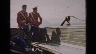 1939: men looking at sea from ship SAN FRANCISCO