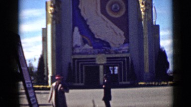 1939: bank building faÃ§ade has huge display of california state symbols