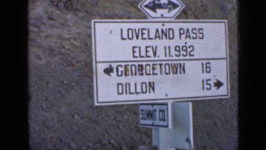 1939: lady posing by street sign. UTAH