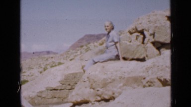 1939: woman sitting on yellow rocks UTAH