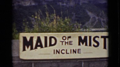 1940: board with content it represents beautiful waterfalls at forest. CANADA