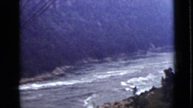 1940: the water running, beautiful scenery with hills, plants, trees CANADA