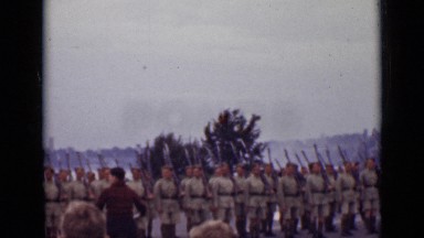 1940: Military Personnel in Formation Lines Outside with Weapons Canada
